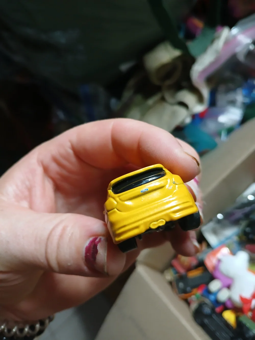 yellow 1:64 scale Maisto Ford Focus ST die-cast toy car